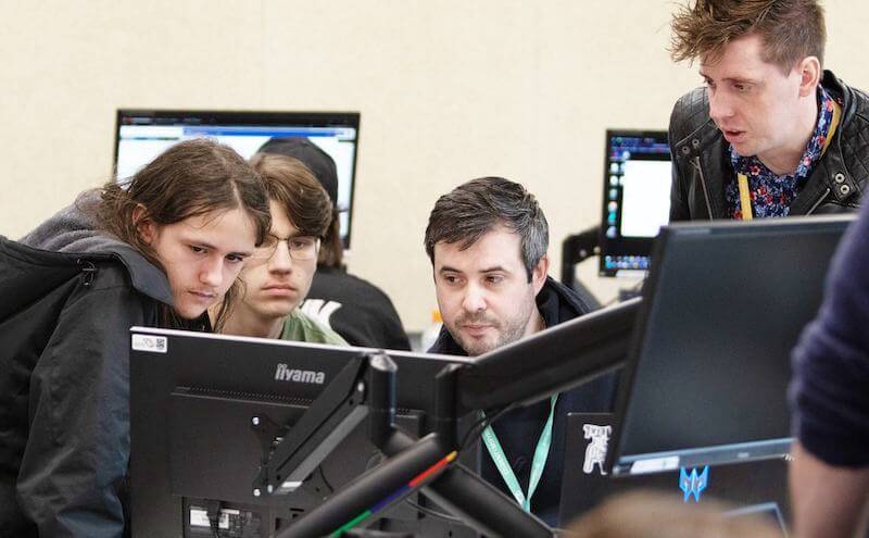 techEdPro team of students all looking at computer screen 800